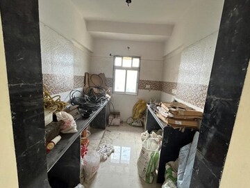 Kitchen in 1 BHK Apartment at Trumph Sai Sadan, Dahisar East – for Sale