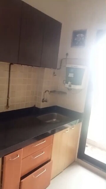 Kitchen in 2 BHK Apartment at Tulsi Sagar, Nerul – for Rent