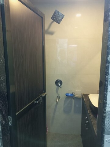 Bathroom in 1 BHK Apartment at Kendriya Vihar Seawoods, Seawoods West – for Rent