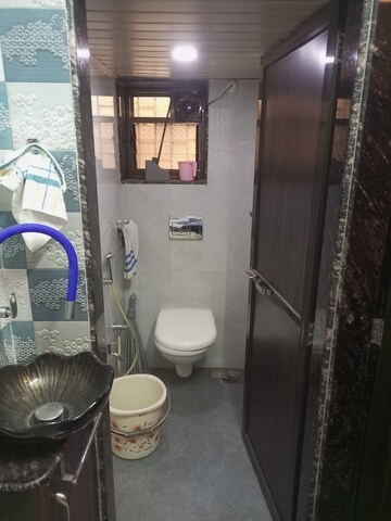 Bathroom in 1 BHK Apartment at Kendriya Vihar Seawoods, Seawoods West – for Rent