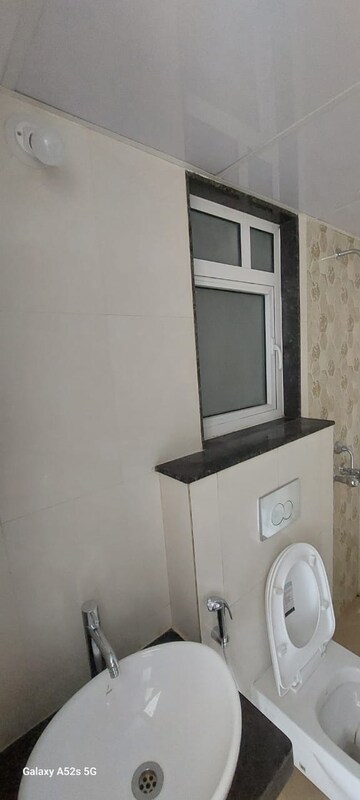 Bathroom in 1 BHK Apartment at JP North Alexa, Mira Road – for Rent