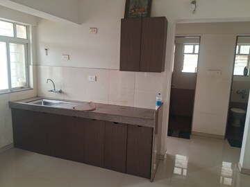 Kitchen in 1 BHK Apartment at Gera Park View, Kharadi – for Rent