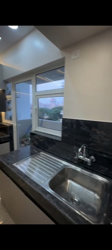 Kitchen in 2.5 BHK Apartment at Experion Capital, Gomti Nagar – for Rent
