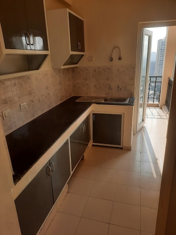 Kitchen in 3 BHK Apartment at Nimbus Express Park View, Chi V Greater Noida – for Sale