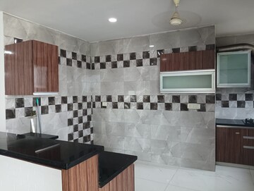 Kitchen in 4 BHK Apartment at Great Value Sharanam, Sector 107 – for Sale