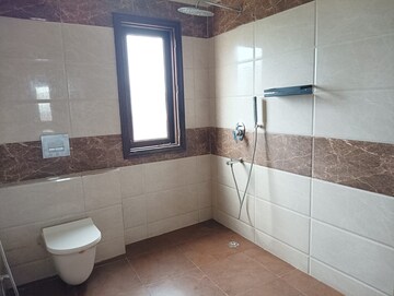 Bathroom in 4 BHK Apartment at Great Value Sharanam, Sector 107 – for Sale