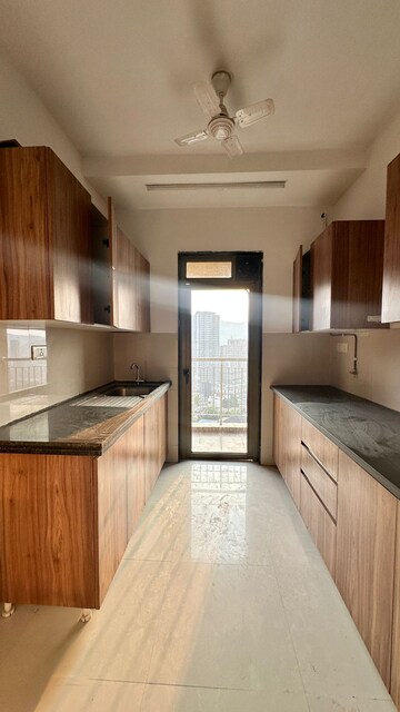 Kitchen in 2 BHK Apartment at Lodha Splendora, Ghodbunder Road – for Sale