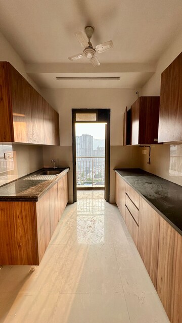 Kitchen in 2 BHK Apartment at Lodha Splendora, Ghodbunder Road – for Sale