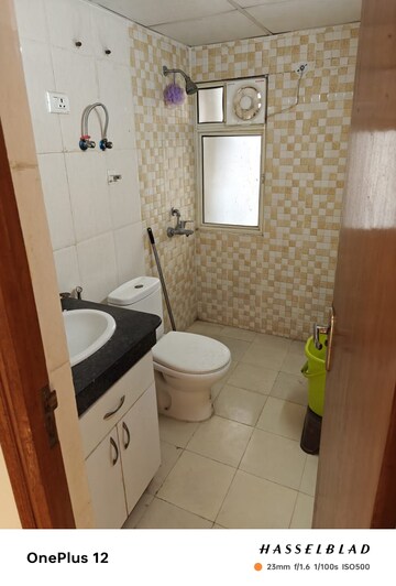Bathroom in 1.5 BHK Apartment at Great Value Anandam, Sector 107 – for Sale