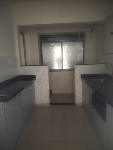 Kitchen in 2.5 BHK Apartment at Amanora Future Towers, Hadapsar – for Rent