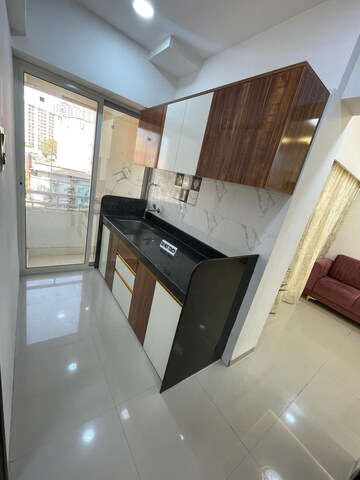 Kitchen in 1 BHK Apartment at Seven Eleven Apna Ghar, Mira Road – for Sale