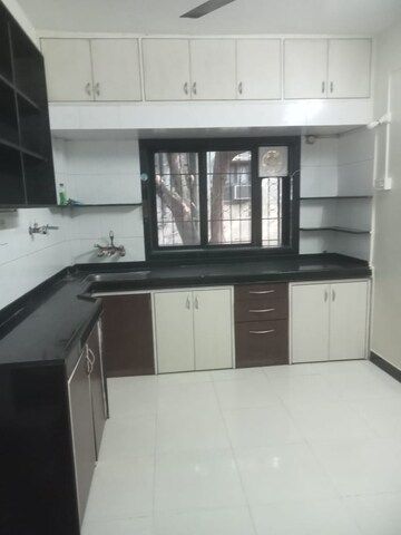 Kitchen in 2 BHK Apartment at Sakal Nagar CHS, Aundh – for Rent