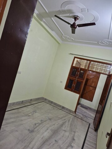 Bedroom in 3 BHK Builder Floor at Ansal Palam Triangle, Palam Vihar Extension – for Rent