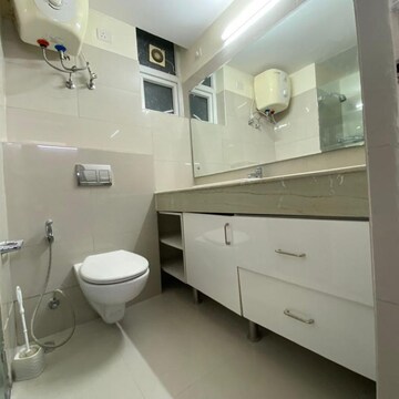 Bathroom in 2 BHK Apartment at Emaar MGF The Palm Drive Studios, Sector 66 – for Rent
