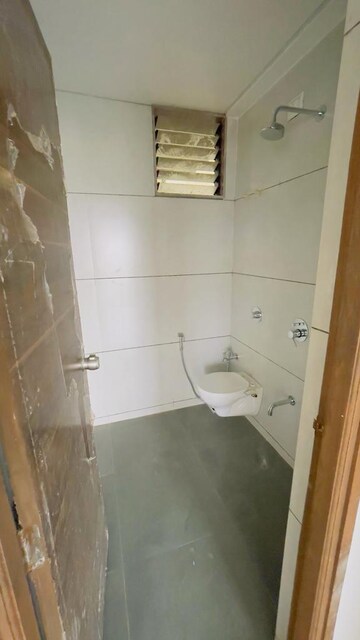 Bathroom in 2.5 BHK Apartment at Ganesh Malabar County, Near Nirma University On Sg Highway – for Rent