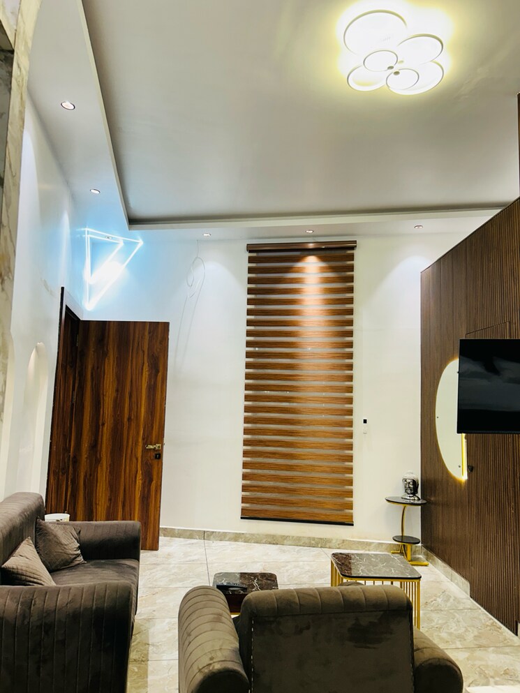 Living Room, concept-capital-the-core-mall Studio 521 Sq.Ft. Apartment In Chipiyana Buzurg Ghaziabad 7917148