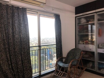 Living Room in 2 BHK Apartment at Rustomjee Athena, Majiwada – for Rent