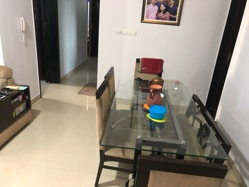 Living Room in 2 BHK Apartment at Rustomjee Athena, Majiwada – for Rent