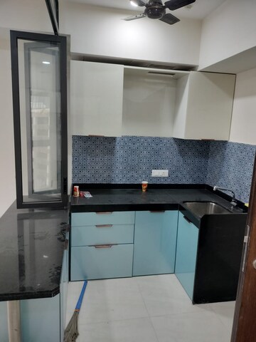 Kitchen in 1 BHK Apartment at Lodha Quality Home Tower 2, Majiwada – for Rent