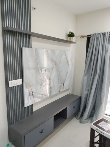 Living Room in 1 BHK Apartment at Lodha Quality Home Tower 2, Majiwada – for Rent