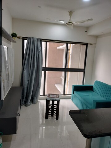 Living Room in 1 BHK Apartment at Lodha Quality Home Tower 2, Majiwada – for Rent