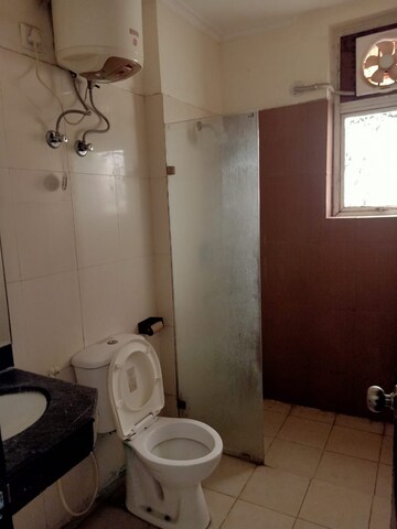 Bathroom in 3 BHK Builder Floor at Ansal API Esencia, Sector 67 – for Rent