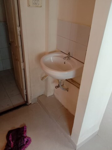 Bathroom in 1 BHK Apartment at New Mhada Tower, Malad West – for Sale
