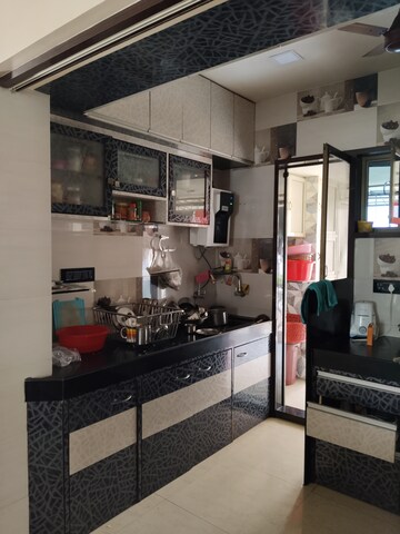 Kitchen in 4 BHK Apartment at Agarwal Ekta Apartment, Borivali East – for Sale