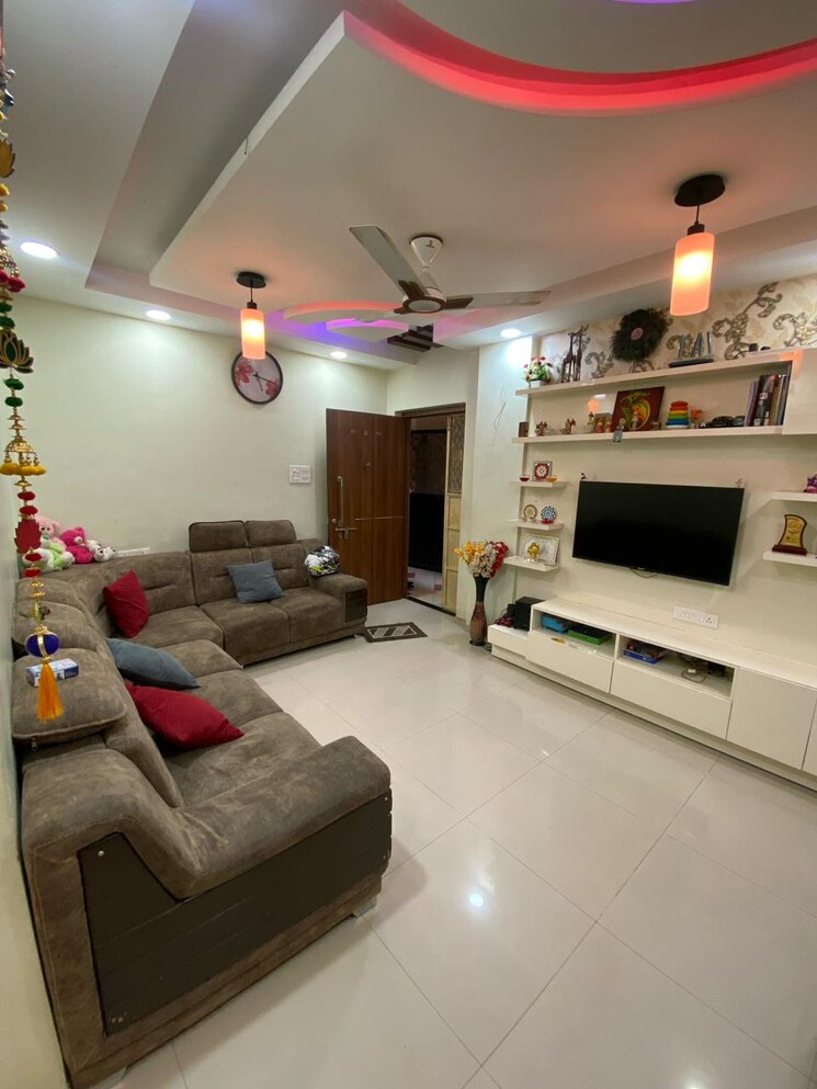 Living Room, tyagi-uttam-plaza 2 Bedroom 950 Sq.Ft. Apartment In Kharadi Pune 7917430