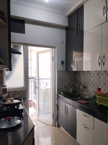 Kitchen in 2 BHK Apartment at Amaatra Homes, Sector 10 Greater Noida – for Rent