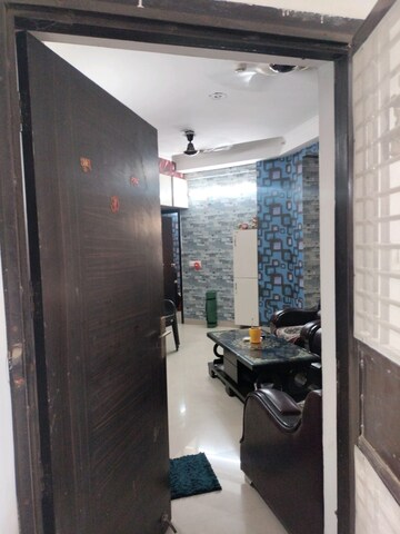 Living Room in 2 BHK Apartment at Amaatra Homes, Sector 10 Greater Noida – for Rent