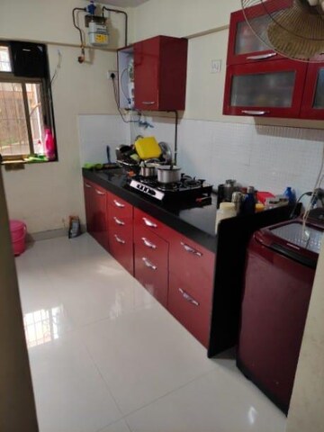 Kitchen in 2.5 BHK Apartment at Runwal Garden City, Balkum Pada – for Rent