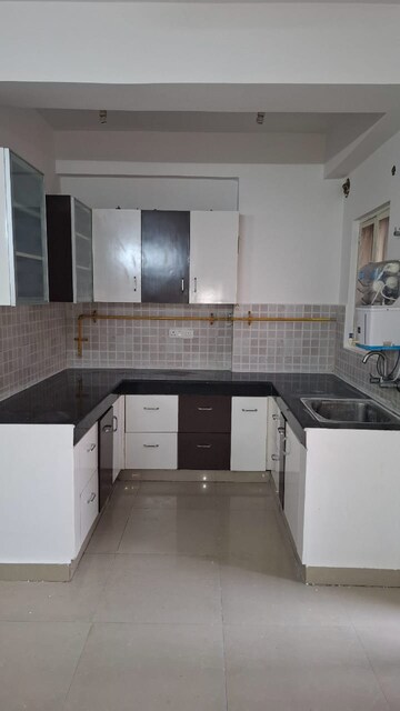 Kitchen in 2.5 BHK Apartment at Amrapali Princely Estate, Sector 76 – for Rent