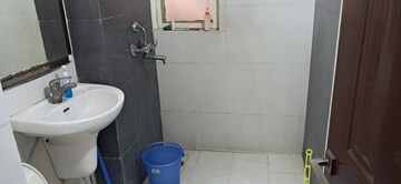 Bathroom in 2.5 BHK Apartment at Amrapali Princely Estate, Sector 76 – for Rent