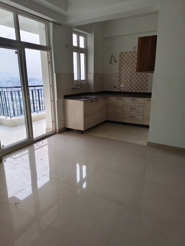 Kitchen in 2 BHK Apartment at Amrapali Princely Estate, Sector 76 – for Rent