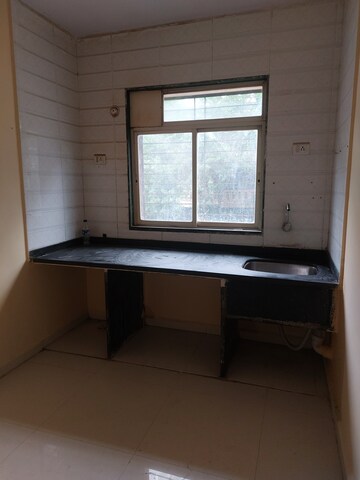 Kitchen in 1 BHK Apartment at Shubh Srushti, Badlapur East – for Sale