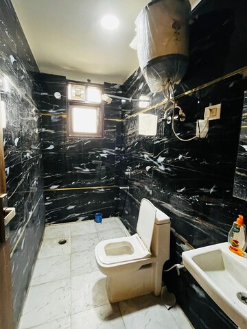 Bathroom in 2 BHK Apartment at Freedom Fighters Enclave – for Rent