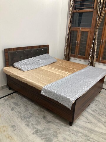 Bedroom in 2 BHK Builder Floor at Ansal Sushant Lok I, Sector 43 – for Rent