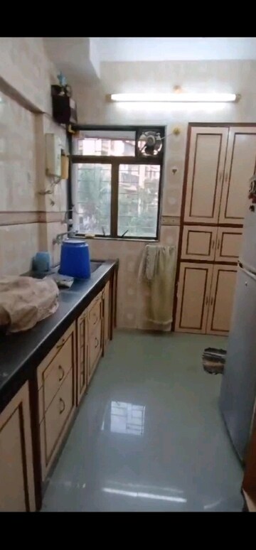 Kitchen in 2 BHK Apartment at Chetwani Swastik Garden, Pokhran Road No 2 – for Sale