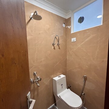 Bathroom in 3 BHK Builder Floor at Palm Residency Chhatarpur, Rajpur Khurd Extension – for Rent