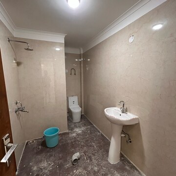 Bathroom in 3 BHK Builder Floor at Palm Residency Chhatarpur, Rajpur Khurd Extension – for Rent
