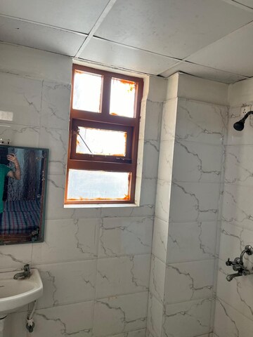 Bathroom in 3 BHK Apartment at Auric City Homes, Sector 82 – for Rent