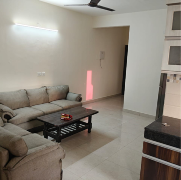 Living Room in 2 BHK Apartment at Signature Orchard Avenue 2, Hayatpur – for Rent