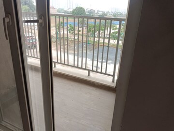 Balcony in 2 BHK Apartment at Signature Orchard Avenue 2, Sector 93 – for Rent