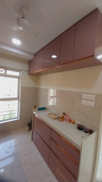 Master Bedroom in 2 BHK Apartment at Crescent Horizon, Kandivali East – for Rent