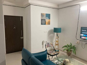 Living Room in 1 BHK Apartment at Duville Riverdale Heights, Kharadi – for Rent