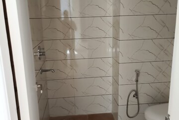 Bathroom in 3 BHK Apartment at Maxxus Elanza, International Airport Road – for Rent