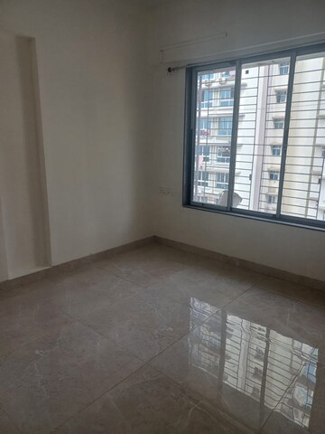 Room in 2 BHK Apartment at Roha Satsang Bharti, Malad East – for Rent