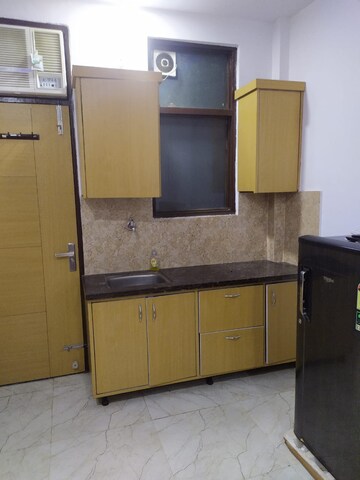 Kitchen in 1 RK Builder Floor at Ansal Sushant Lok I, Sector 43 – for Rent