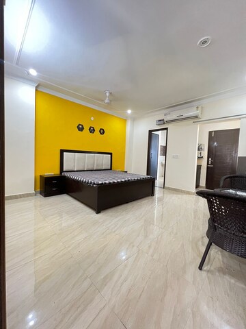 Bedroom in Studio Builder Floor at Ansal Sushant Lok I, Sector 43 – for Rent